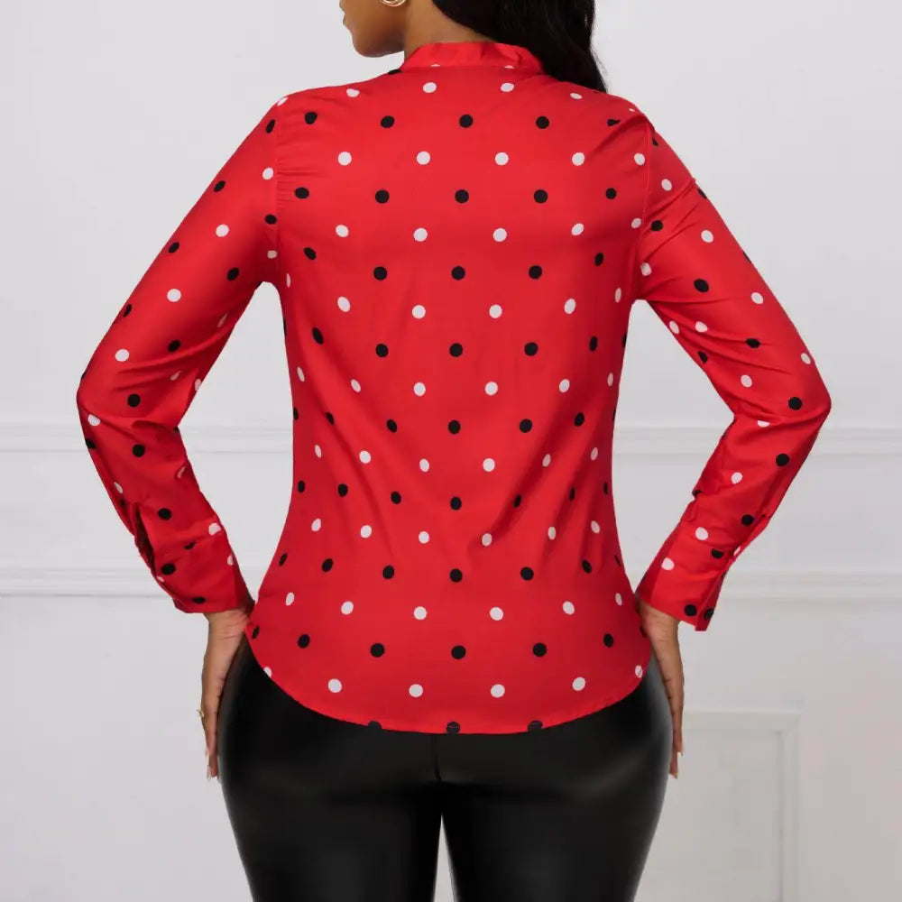Elegant printed polka dot red bow blouse featuring long sleeves with black and white polka dots in a soft fabric