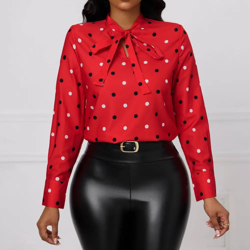 Elegant printed polka dot red bow blouse with long sleeves and neckline bow for a stylish formal look