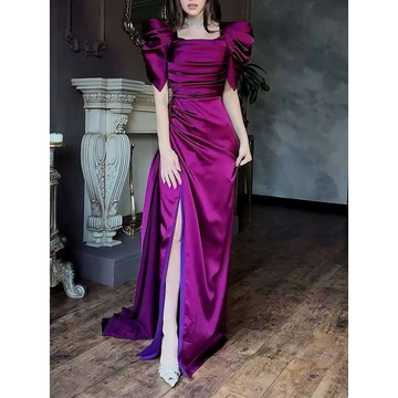 A shimmering magenta satin elegant puff sleeve pleated slit magenta maxi dress with puffed sleeves and a high slit