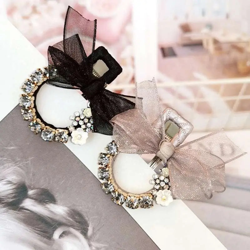 Elegant rhinestone mesh butterfly hairpin with black and champagne colors, sparkling rhinestones, lace, and delicate floral accents