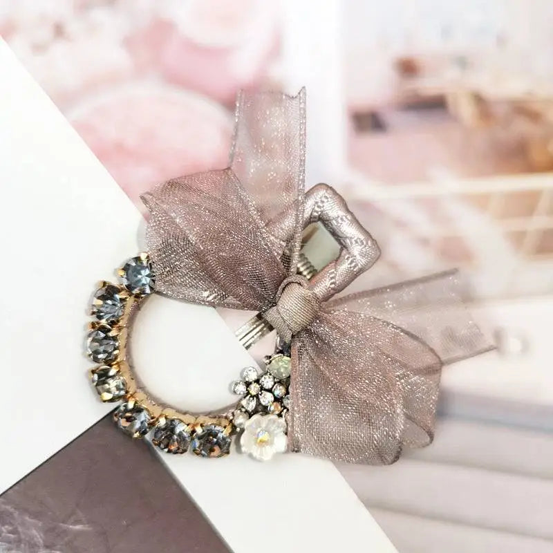 Elegant rhinestone mesh butterfly hairpin in rose gold with a sheer bow and sparkling rhinestones adorns fashion lace hairpin