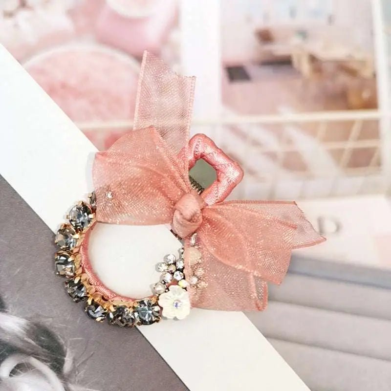 Elegant rhinestone mesh delicate pink sheer bow mesh butterfly hairpin with sparkling rhinestones and white floral accent