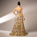Elegant sleeveless sequined suspender evening dress in beige with floral gown design and intricate sequin embroidery