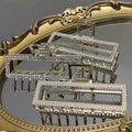 Elegant sweet pearl silver claw clip with a silver rectangular frame adorned with sparkling rhinestones along edges