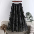 Black sheer lace mesh skirt with embroidered bow lace and delicate butterfly embroidery mid-length design