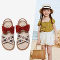 Beige children’s soft-soled sandals with red suede bows and colorful embroidered floral big design for baby children’s shoes