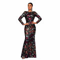 A black long-sleeved evening gown with embroidered floral burgundy and metallic silver embroidery in mermaid style