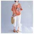 Orange floral print linen top with floral embroidery made of embroidered Korean cotton hemp fabric for casual wear