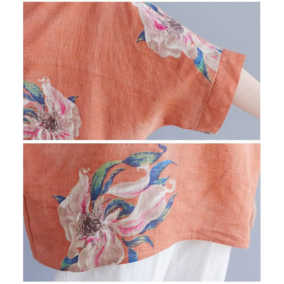 A peach-colored embroidered Korean cotton hemp top with floral embroidery in pink white and blue blossoms