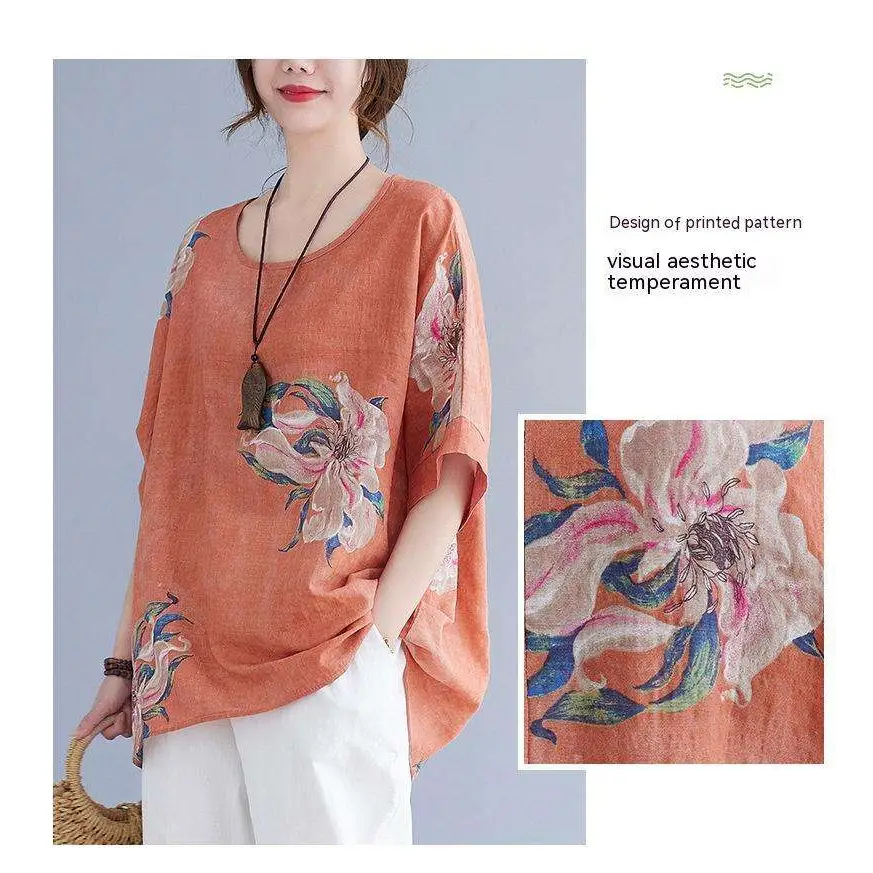 A soft peach embroidered Korean cotton hemp half sleeve top with loose fit and vibrant floral embroidery in pink and blue