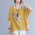 Yellow linen half sleeve top with floral embroidery in soft pastel tones and blue accents made of embroidered korean cotton hemp fabric