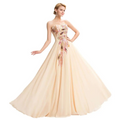 Beige strapless chiffon ball gown with intricate embroidered peacock heart collar dress detailing in gold pink and brown tones