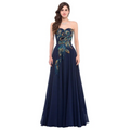 A navy blue strapless chiffon evening gown with embroidered peacock heart and intricate teal and gold embroidery