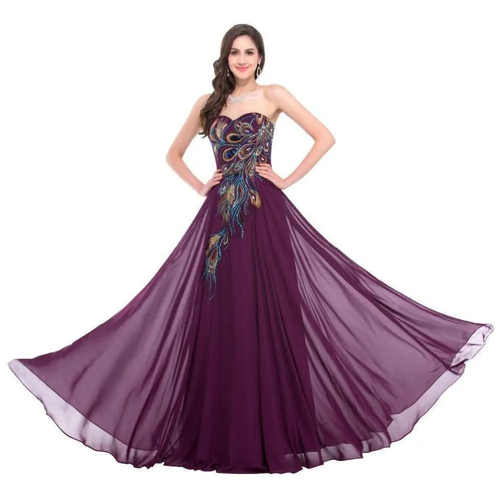 A flowing deep purple strapless chiffon gown with embroidered peacock heart gold and blue embellishments heart collar dress