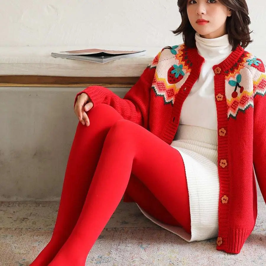 Embroidered red cardigan with strawberry and cherry details paired with red stepping pants in nylon single layer material