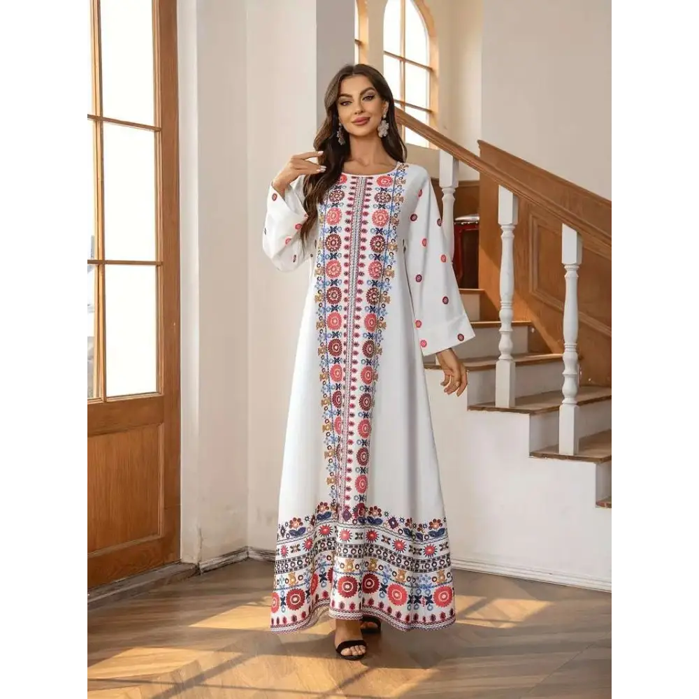 White embroidered rhinestone bead long sleeve maxi dress with colorful geometric patterns on placket hem and cuffs