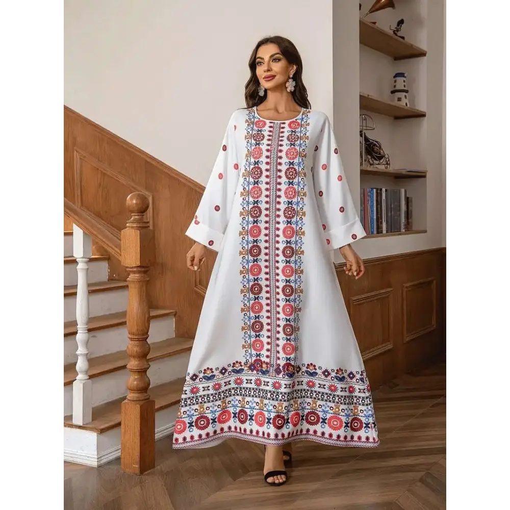 White embroidered rhinestone bead sleeve maxi dress with intricate red blue and gold circular floral print patterns