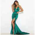Emerald green satin mermaid gown with plunging v-neckline and high slit for company annual meeting