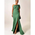 A sleek emerald green satin shoulder evening gown with a dramatic bow and high slit for formal occasions