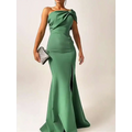 A sleek emerald green bow satin mermaid shoulder evening gown with a draped bow accent for formal occasions