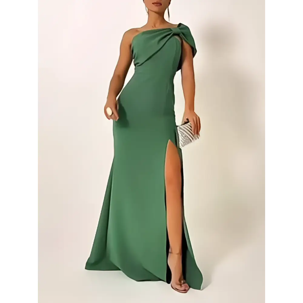 Emerald green bow one-shoulder evening gown with draped knot detail and high slit for elegant occasions