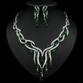 Elegant emerald green crystal zircon jewelry set with silver leaf-inspired necklace and cascading teardrop earrings