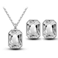 Silver-toned rectangular emerald green crystal necklace pendant and matching earrings set in green crystal necklace style