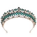 Emerald green and black crystal bridal knot tiara with sparkling gold fashion metalwork in gold tone for weddings