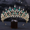 Ornate gold sparkling fashion bridal knot tiara adorned with emerald green and clear crystal jewels for weddings