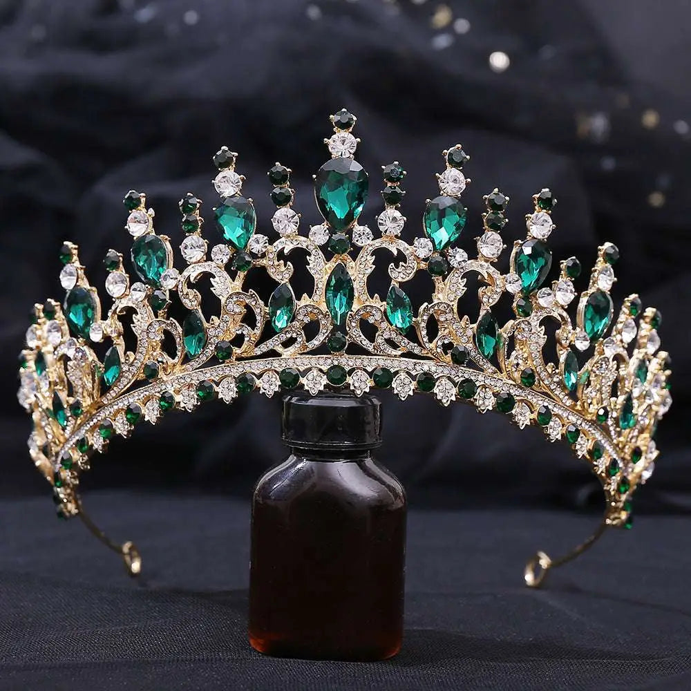 Ornate gold sparkling fashion bridal knot tiara adorned with emerald green and clear crystal jewels for weddings