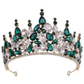 Emerald green bridal knot tiara with sparkling gold fashion metal base featuring clear crystal accents