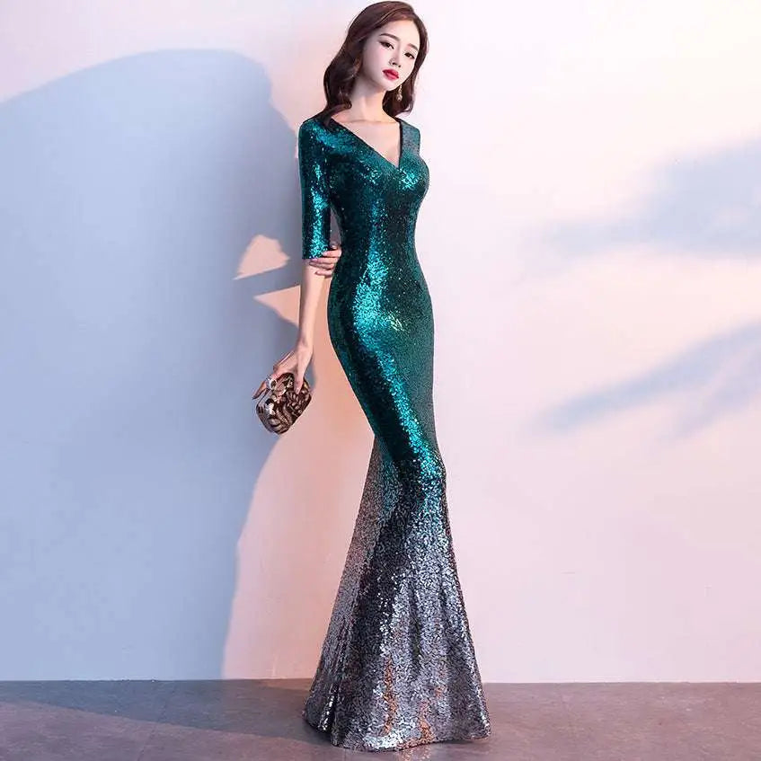 Emerald green polyester fiber sequined annual meeting gown with v-neckline and three-quarter sleeves mermaid design