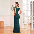 Emerald green sequined off-the-shoulder high waist mermaid gown with a form-fitting evening silhouette