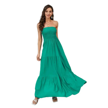 Emerald green strapless tiered maxi dress with smocked bodice and relaxed fit flowing fabric for elegant wear