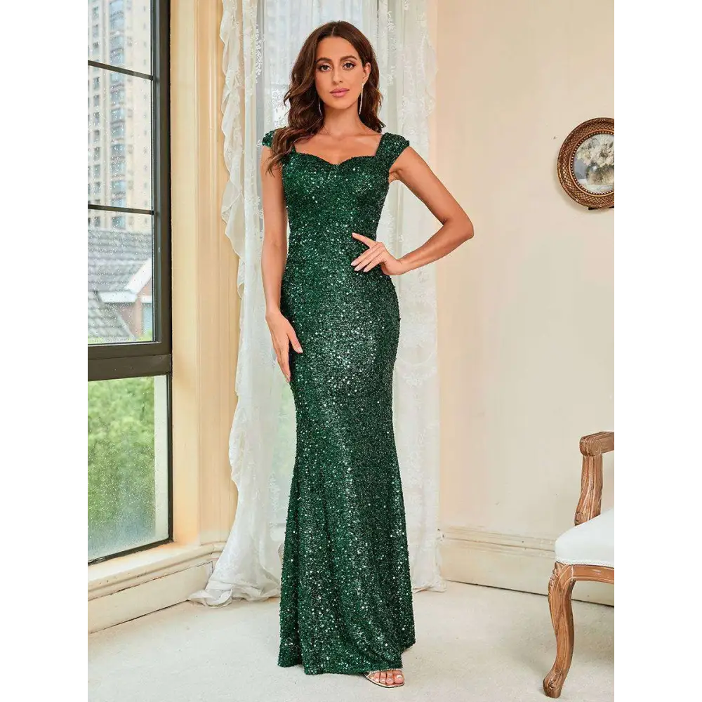 Emerald green suspenders mid waist sequin gown with cap sleeves and square neckline in mermaid style evening dress