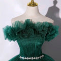 Emerald green tulle evening dress banquet featuring off-the-shoulder layered ruffles and a sparkling crystal belt