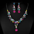A vibrant multi-colored crystal wedding bride necklace and earrings set with silver-toned metal for western wedding photography