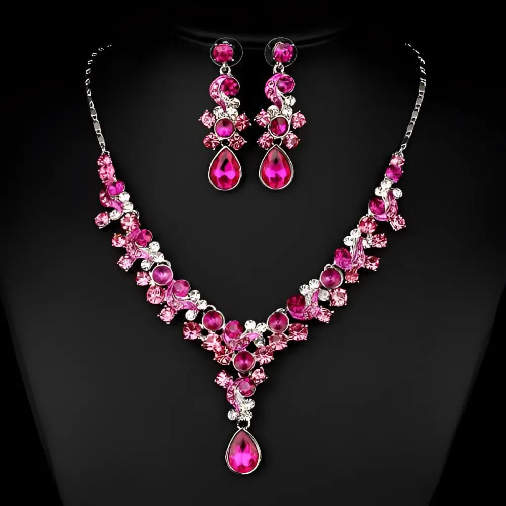 A sparkling pink and silver crystal wedding bride necklace with teardrop pendants for western wedding photography use