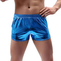 Emerald metallic mens loose casual shorts in shiny blue metallic fabric with elastic waistband for trendy wear