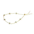 Gold-toned emerald pearl flowers bracelet with delicate floral charms, green gemstones, pearls, and fashion adjustable chain