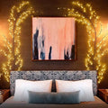 Enchanting vine lights warm led tree branch decor with warm yellow lights creating a tranquil oasis around a bed