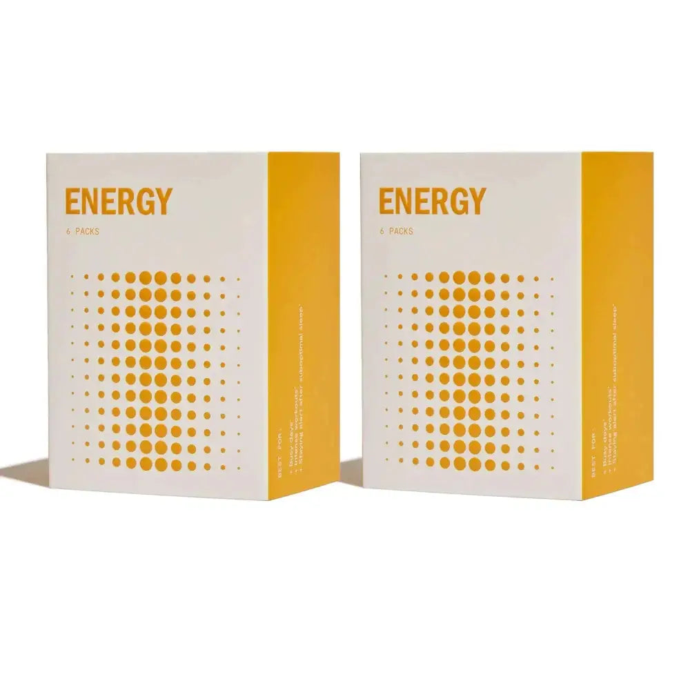 Two white and orange energy supplement boxes with dotted pattern containing 12 nootropic brain support packs for cognitive supplement and physical drive