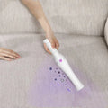 Ergonomic travel sterilization lamp stick handheld travel sterilization device white with purple button and textured grip
