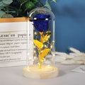 Eternal rose led light featuring a sparkling blue rose with golden leaves in an elegant glass dome romantic gift set