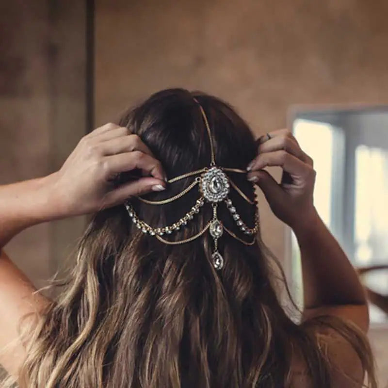 Ethnic purple crystal style headwear featuring a delicate gold-toned headpiece with rhinestones and teardrop charms