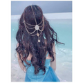 A delicate multi-strand gold-toned ethnic purple crystal style headwear hair accessory with rhinestones and teardrop charms