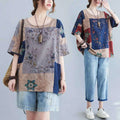 Ethnic style loose round neck floral patchwork blouse with faded blue and beige panels and muted tone embroidery