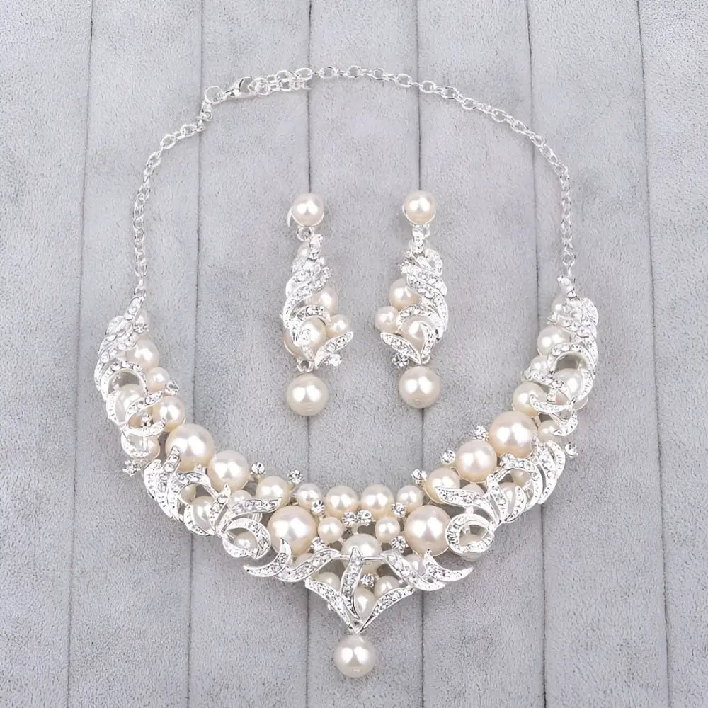 Elegant silver-toned europe pearl necklace and earrings set with cream pearls and rhinestones in floral design for bridal use