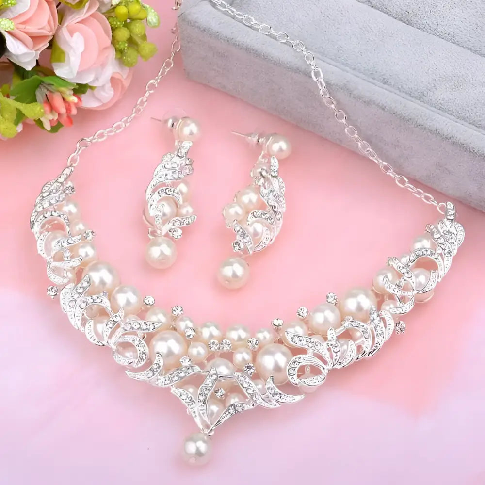 Silver-toned europe pearl necklace with intricate floral design featuring cream pearls and sparkling rhinestones bridal jewelry