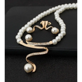 Elegant gold-toned european fashion diamond crystal pearl jewelry set featuring a flowing rhinestone and pearl necklace